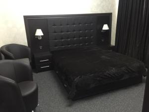 Ein Bett oder Betten in einem Zimmer der Unterkunft Hotel Chamishki