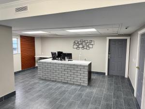 an office with a reception desk in a room at Quality Inn Carlin in Carlin