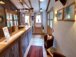 a hallway with a bar in a restaurant at Beautiful lodging in the Alps near Bayrischzell in Bayrischzell