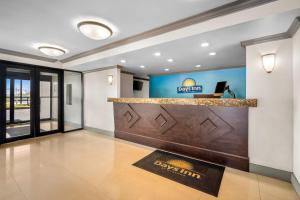 a lobby of a hotel with a reception counter at Days Inn by Wyndham Florida City in Florida City +60 photos