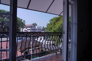 a view from the window of a balcony at The Polaris in Cochin +18 photos