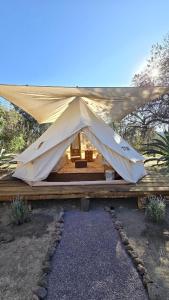 a large white tent sitting on top of a building at Finca los ciervos in Apan