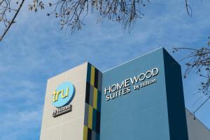 a building with the hw innovation services department at Homewood Suites By Hilton Saltillo in Saltillo