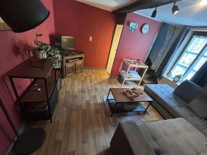an overhead view of a living room with a couch at Chez Germaine in Bouillon