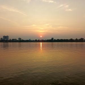 a sunset over a large body of water at Our Place Silk Island in Silk Island