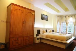 Letto o letti in una camera di Bed and Breakfast Thamel