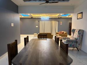 a conference room with a table and chairs at Yelagiri castle in Yelagiri