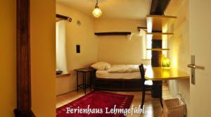 Postel nebo postele na pokoji v ubytování Lehmgefühl, Design Vier, La Petite Maison