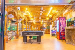a store with a pool table in the middle of a room at Green Mountain Homestay in Ninh Binh