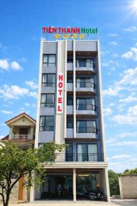 a hotel with a sign on top of it at Tiến Thành Hotel Nghệ An in Vinh