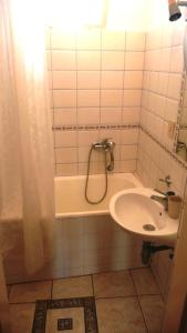 a small bathroom with a sink and a shower at Casa di Rose in Vrsar +34 photos