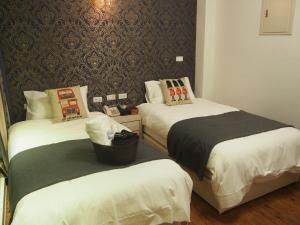 Postel nebo postele na pokoji v ubytování Successful 168 B&B