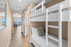 a bedroom with two bunk beds in a room at Windancer 110 in Destin