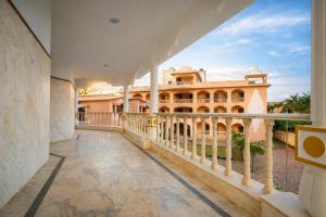 a view from the balcony of a mansion at Gangabagh by Divine Trails - Hotel Near Har Ki Pauri, Haridwar in Haridwār