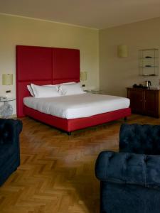 Un pat sau paturi într-o cameră la Relaisfranciacorta