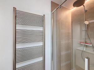 a shower with a glass door in a bathroom at Villa Pomone - Sint-Idesbald in Koksijde +32 photos