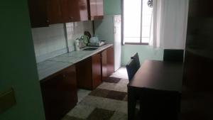 Kjøkken eller kjøkkenkrok på Adana Hostel 1