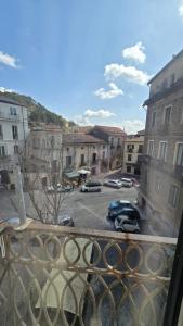 a view of a parking lot from a balcony at Numistrano Room in Lamezia Terme