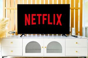 a television on top of a white dresser at Scenic Condo 50 sqm Karon in Karon Beach