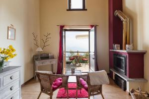 a dining room with a table and a mirror at Agriturismo Da Attilio in Cannobio