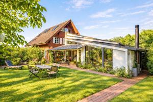 an exterior view of a house with a patio at Boutique Loft Studio in Kreuzlingen +14 photos