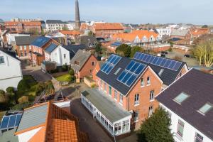 a group of houses with solar panels on them at Woge2 Appartement 7 in Borkum