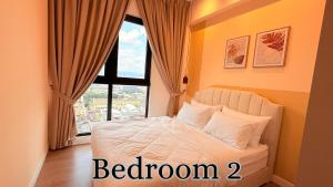a bedroom with a bed with a window at Skyline Luxury Suite KlCC &TRX View in Kuala Lumpur +56 photos