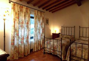 A bed or beds in a room at Villa Santa Maria a Bovino