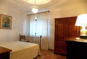 A bed or beds in a room at Villa Santa Maria a Bovino