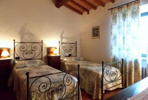 A bed or beds in a room at Villa Santa Maria a Bovino