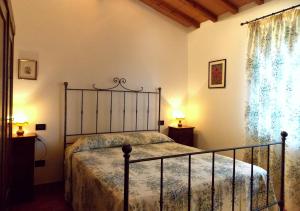 A bed or beds in a room at Villa Santa Maria a Bovino