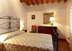 A bed or beds in a room at Villa Santa Maria a Bovino