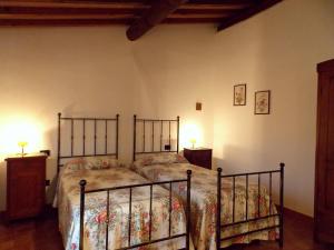 A bed or beds in a room at Villa Santa Maria a Bovino