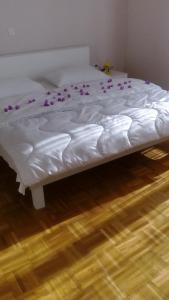 Postel nebo postele na pokoji v ubytování Apartments Katarina
