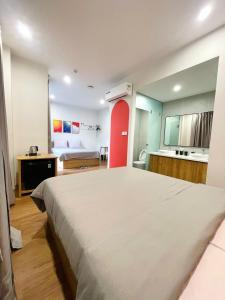 a bedroom with a large bed in a room at Thanh hoa HOMESTAY in Hòa Bình +3 photos
