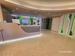 a lobby of a hotel with a reception desk at Panorama in Monemvasia