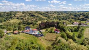 an aerial view of a large house on a green field at Villa Lady Berga by Villas Guide in Ludbreg