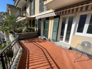 a house with a walkway leading to a porch at Casa Leone sea&terrace in Bogliasco