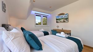 a bedroom with three beds and a window at Villa Lady Berga by Villas Guide in Ludbreg +48 photos