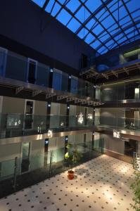 a large building with a potted plant in the middle at No 19 Boutique Hotel in Ankara