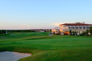 a view of the green on the golf course at Lighthouse Golf & Spa Hotel - Mineral Pools, Premium All Inclusive, SPA & Beach Access, Free Parking in Balchik