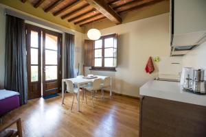 A kitchen or kitchenette at Spa Resort Fonte Alla Lepre