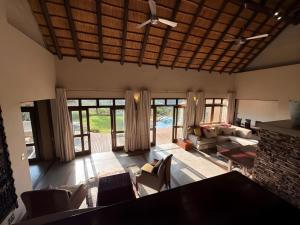 a living room with a couch and a table at Castle View in Pretoria +56 photos