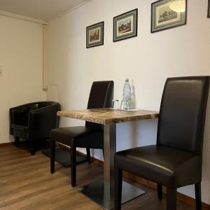 a conference room with a table and chairs at Eifelerhof hotel Monschau in Monschau