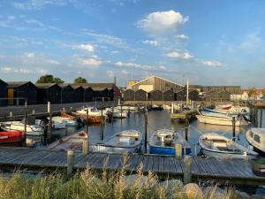 a bunch of boats docked in a harbor at City gæstehus kerteminde in Kerteminde