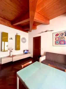a living room with a couch and a table at Raggio di Sole in Montesilvano