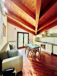 a living room with a couch and a table at Raggio di Sole in Montesilvano