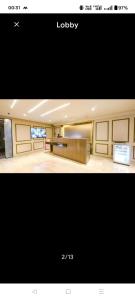 a picture of a room with a lobby at HotAlnovaiN in Agra