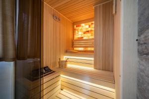 a sauna with a window in a wooden house at Divski Resort in Divčibare +62 photos