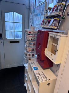 a room with a sewing machine on top of boxes at Guesthouse Czaar Peter in Zaandam